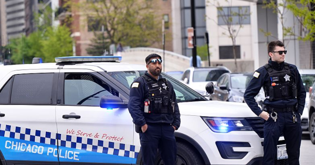 chicago:-at-least-13-shot-when-drive-by-shooters-open-fire