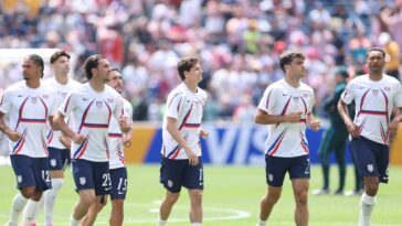 entire-us-soccer-team-huddles-in-prayer-after-historic-world-cup-win