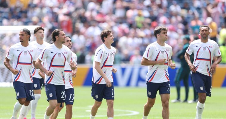 entire-us-soccer-team-huddles-in-prayer-after-historic-world-cup-win