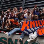 watch:-new-york-knicks-fan-dumps-trash-to-steal-hand-painted-can