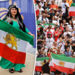 iranian-fans-defy-fifa-ban-again-as-forbidden-flags-flood-stadium-during-world-cup-clash-with-belgium
