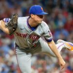 mets-cubs-game-postponed-as-pounding-rain-blankets-queens