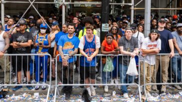 dei-exec-fired-after-getting-caught-on-camera-allegedly-stealing-at-knicks-championship-parade