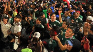 fan-celebrates-mexico-advancing-in-the-world-cup-by-dunking-his-head-into-a-cotton-candy-machine
