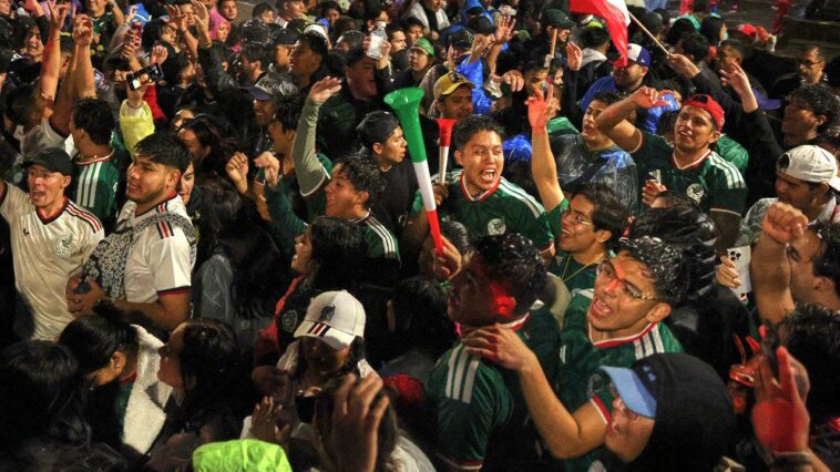 fan-celebrates-mexico-advancing-in-the-world-cup-by-dunking-his-head-into-a-cotton-candy-machine
