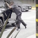 angry-man-seen-dangling-off-the-side-of-car-in-san-francisco-road-rage-incident:-‘he’s-running-him-over’