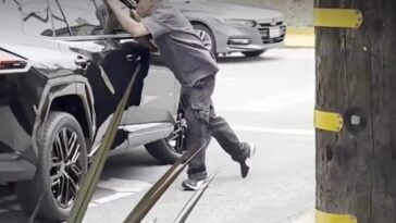 angry-man-seen-dangling-off-the-side-of-car-in-san-francisco-road-rage-incident:-‘he’s-running-him-over’