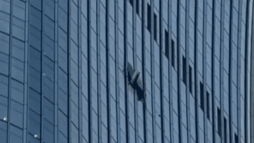 video-shows-gaping-hole-after-small-plane-crashes-into-towering-skyscraper