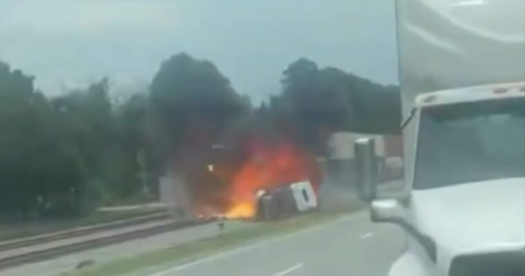 semi-truck-driver-flees-after-fiery-collison-with-freight-train-in-atlanta-–-trucking-company-linked-to-12-crashes-(video)