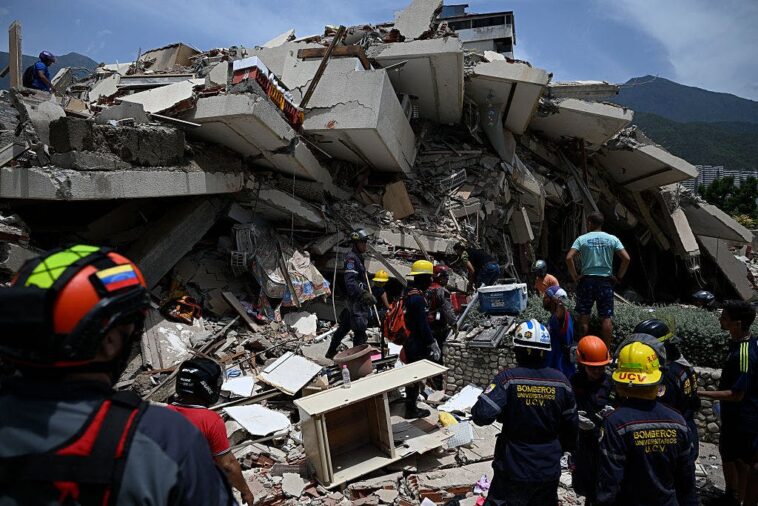 watch:-rescuers-pull-dog-from-rubble-as-earthquake-death-toll-rises