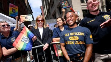 nypd-commish-stands-with-armed-gay-cops-on-sidelines-of-nyc-pride-march-after-slamming-organizers-for-barring-them