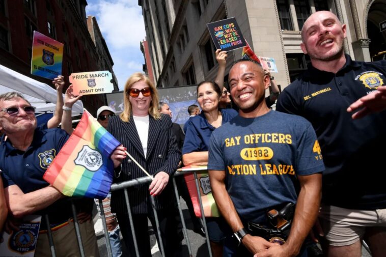 nypd-commish-stands-with-armed-gay-cops-on-sidelines-of-nyc-pride-march-after-slamming-organizers-for-barring-them