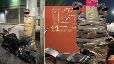 mexican-‘batman’-vigilante-wanted-for-chasing-down-suspected-motorbike-thieves,-taping-them-to-lampposts