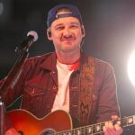 country-star-morgan-wallen-showcases-christian-faith-with-bible-verse-on-cast-during-concert