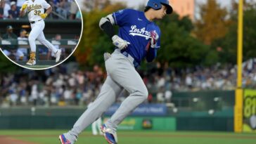 shohei-ohtani’s-long-homer-helps-lift-dodgers-past-a’s-in-wild-slugfest