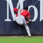 reds’-dane-myers-carted-off-field-after-crashing-into-wall-making-acrobatic-catch-vs-brewers