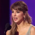watch:-taylor-swift-gets-hostile-reaction-from-country-music-fans-during-surprise-appearance