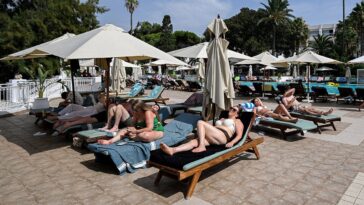 tourists-shown-in-stampede-for-pool-lounge-chairs-after-endless-wait-at-holiday-resort