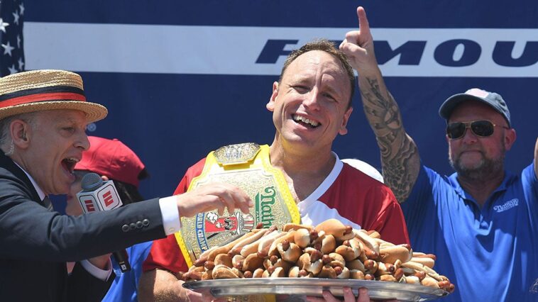 legendary-joey-chestnut-wins-18th-nathan’s-hot-dog-eating-contest-by-downing-66-wieners-and-buns