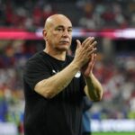 egypt-national-team-manager-waves-palestinian-flag-after-world-cup-win-over-australia
