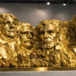 (video)-trump-posts-video-featuring-gold-mount-rushmore-with-a-new-addition-–-serves-mount-rushmore-cookies-with-his-face-on-air-force-one