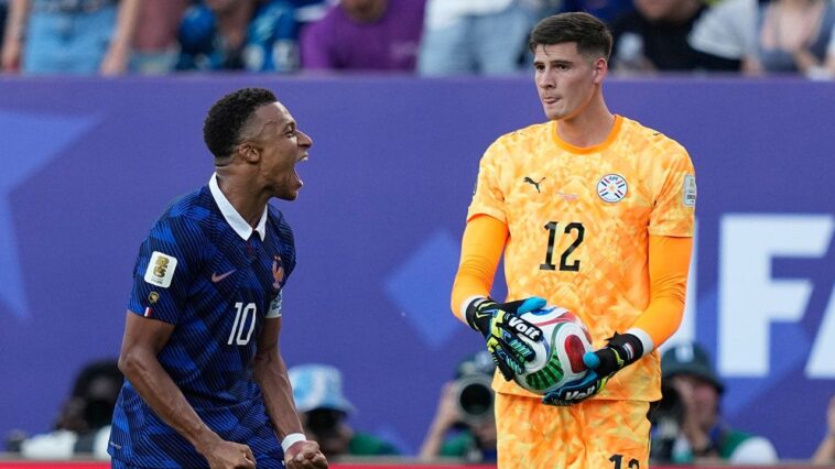 paraguay-goalie-tosses-ball-at-france’s-kylian-mbappe-after-world-cup-showdown