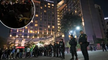 mexico-fans-play-music,-launch-fireworks-outside-of-england’s-hotel-before-world-cup-clash