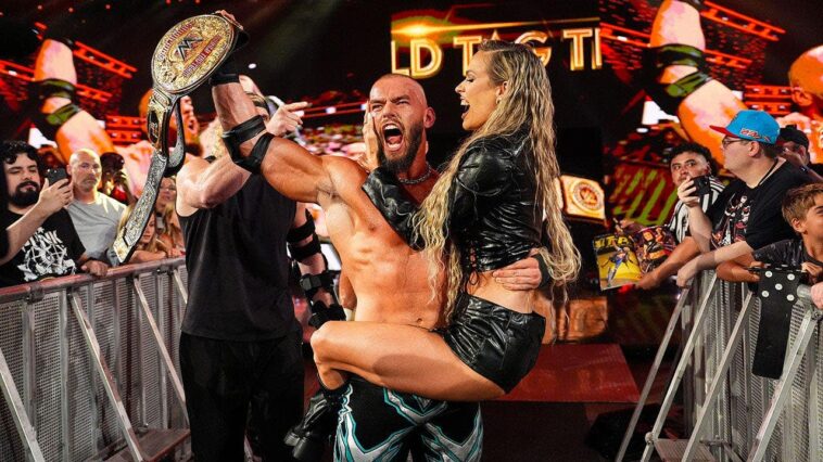 wwe’s-maxxine-dupri-helps-austin-theory-and-bron-breakker-win-world-tag-team-championship,-seals-win-with-kiss