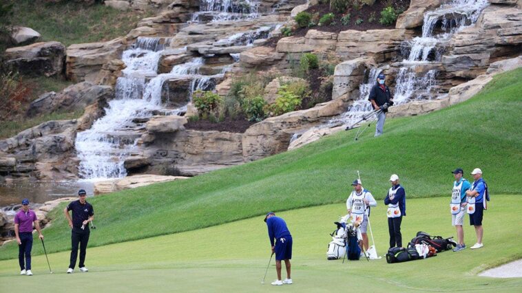 golfers-appear-to-launch-cart-off-cliff-and-land-in-the-water-at-course-in-missouri-designed-by-tiger-woods