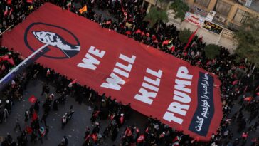 iranians-unfurl-chilling-banner-with-trump-assassination-threat-at-ayatollah-khamenei’s-burial