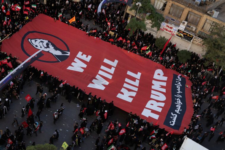 iranians-unfurl-chilling-banner-with-trump-assassination-threat-at-ayatollah-khamenei’s-burial