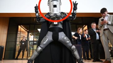 nigel-farage-makes-election-gambit-after-resignation,-now-he-faces-a-man-with-a-trash-can-head
