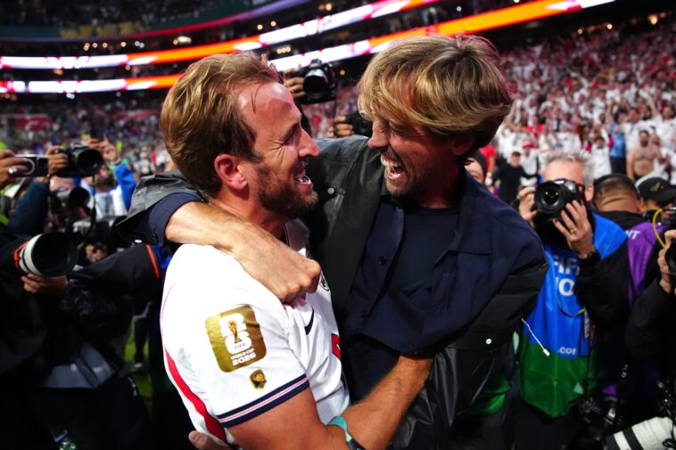 harry-kane-presents-england-legacy-cap-to-peter-crouch-during-three-lions-camp-visit