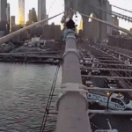 dramatic-bodycam-video-captures-nypd-officer-rescuing-woman-from-top-of-brooklyn-bridge-after-emotional-plea
