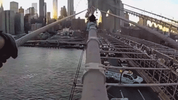 dramatic-bodycam-video-captures-nypd-officer-rescuing-woman-from-top-of-brooklyn-bridge-after-emotional-plea