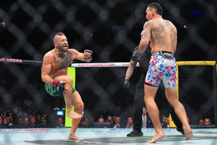 conor-mcgregor-injures-leg-just-seconds-into-fight-in-quick-loss-to-max-holloway-—-and-is-heavily-booed-by-ufc-329-fans