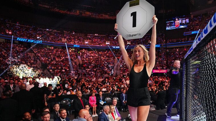 sophie-cunningham-kicks-off-her-shoes-and-walks-the-octagon-at-ufc-329-as-a-surprise-ring-girl
