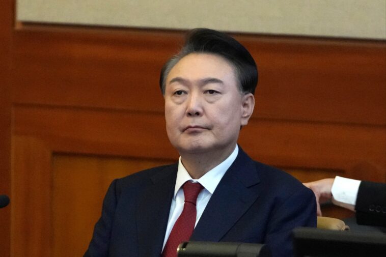 south-korean-court-sentences-ousted-president-yoon-to-2-years-over-manipulated-opinion-polls