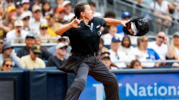 mlb’s-female-ump-leaves-both-teams-fuming-with-odd-calls,-nascar-wife-hits-the-beach-&-aaron-rodgers-emerges!