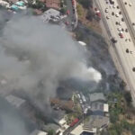 fast-moving-la-wildfire-torches-home,-threatens-nearby-properties