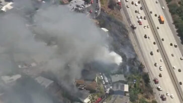 fast-moving-la-wildfire-torches-home,-threatens-nearby-properties