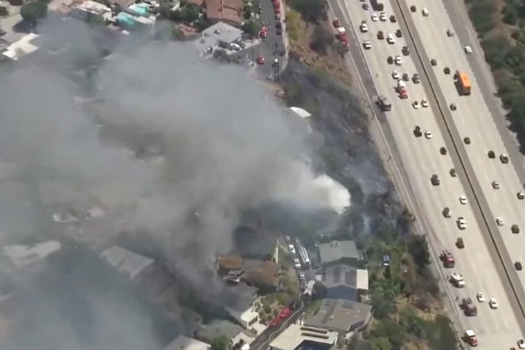 fast-moving-la-wildfire-torches-home,-threatens-nearby-properties