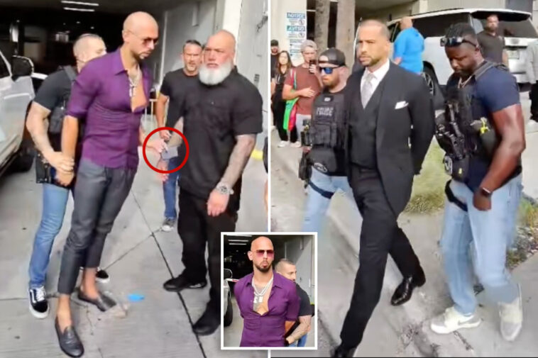 andrew-tate-arrest-video-shows-moment-he-tried-to-give-phone-to-bodyguard-as-he’s-cuffed-by-us-marshals