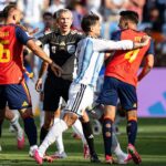 world-cup-brawl-sees-argentina-player-putting-hand-on-throat-of-spain-opponent-after-match