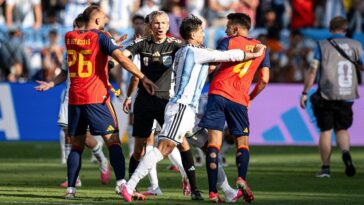 world-cup-brawl-sees-argentina-player-putting-hand-on-throat-of-spain-opponent-after-match