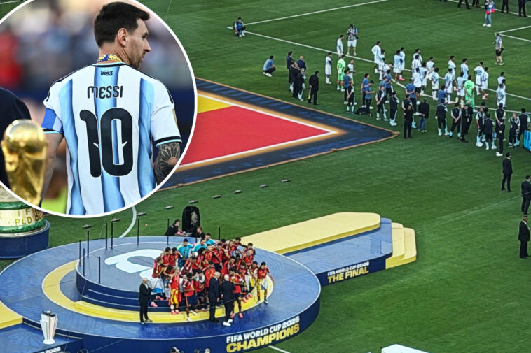 sore-loser-argentina-turn-their-backs-to-spain-during-world-cup-trophy-celebration-after-igniting-post-match-brawl