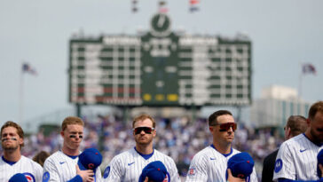 video:-older-chicago-cubs-fan-smacks-young-man-for-not-standing-during-national-anthem