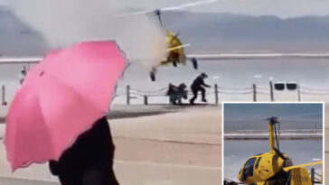terrifying-video-shows-helicopter-crash-landing-on-two-tourists