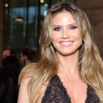 heidi-klum-ditches-bikini-top,-covers-up-with-potato-chip-bag-on-beach-vacation