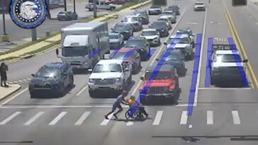 ‘spider-man’-superhero,-20,-saves-the-day-helping-man-in-wheelchair-pass-six-lanes-of-traffic